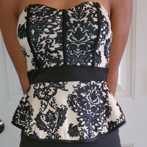 Peplum style strapless dress